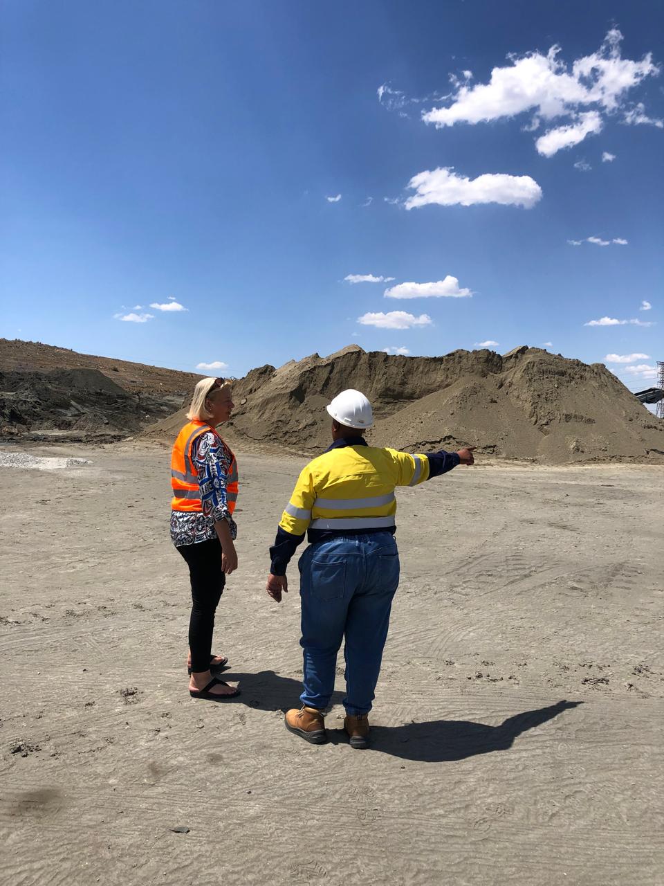 Stockpiles at a mineral processing site under open sky