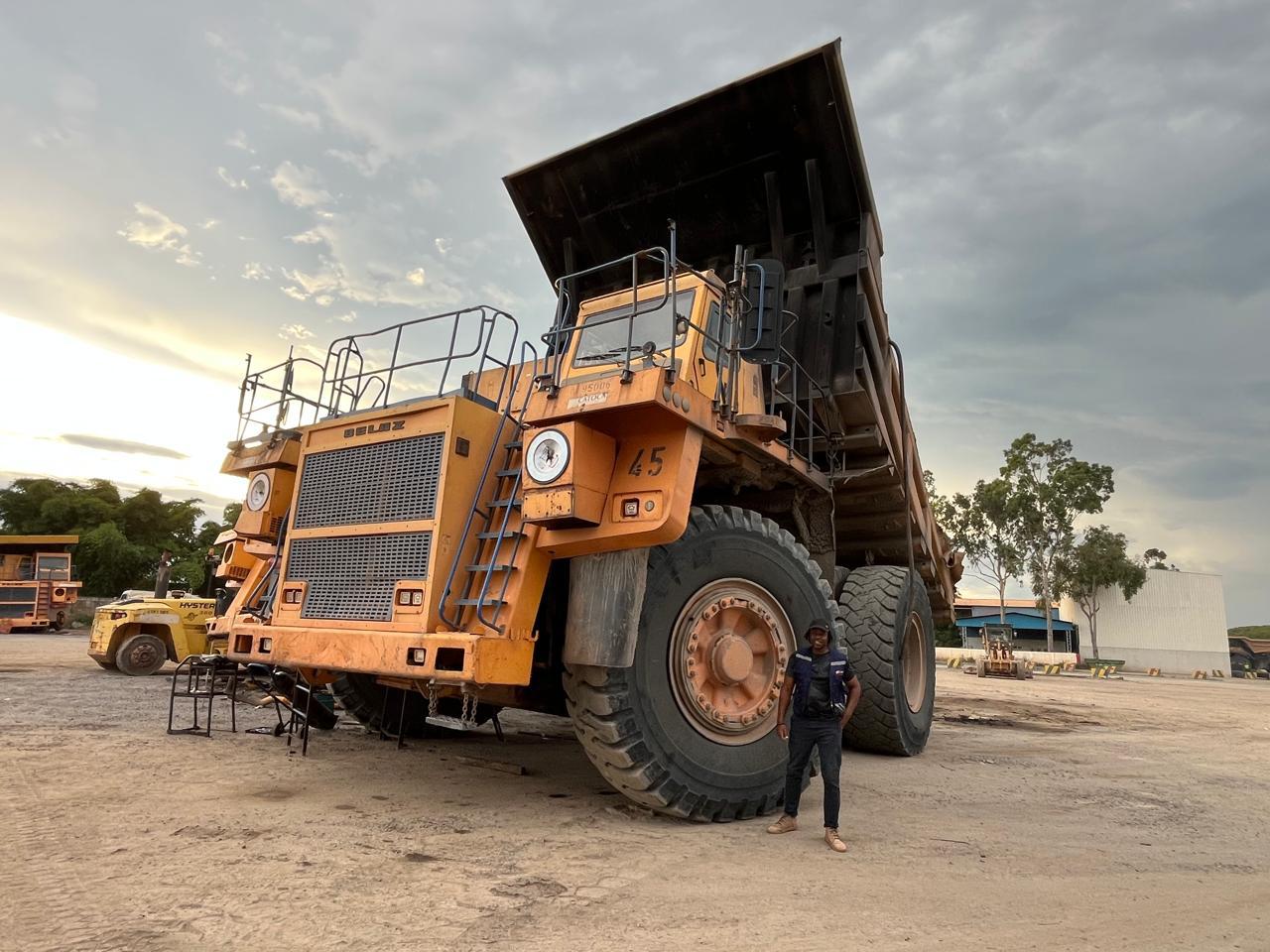 On site at the Catoca diamond mine beside a haul truck