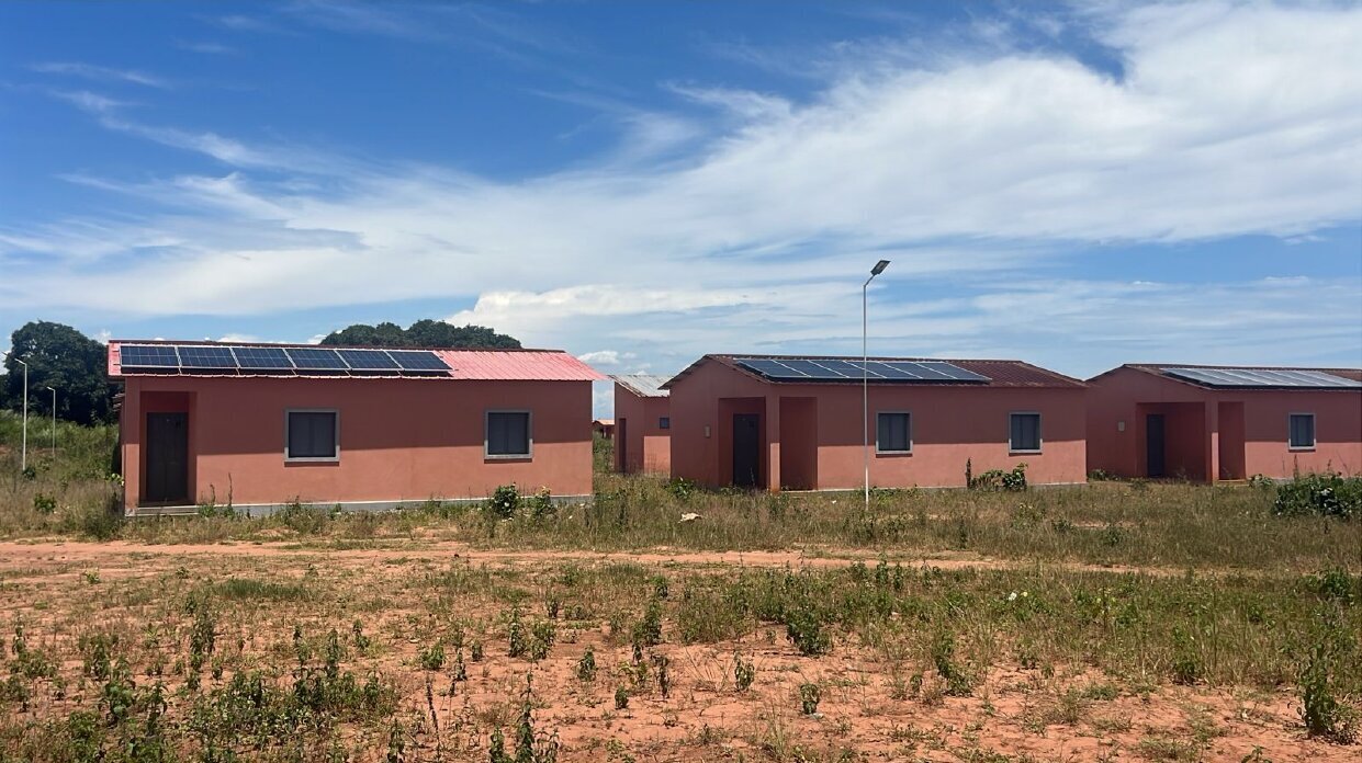 Completed housing row with rooftop solar panels installed
